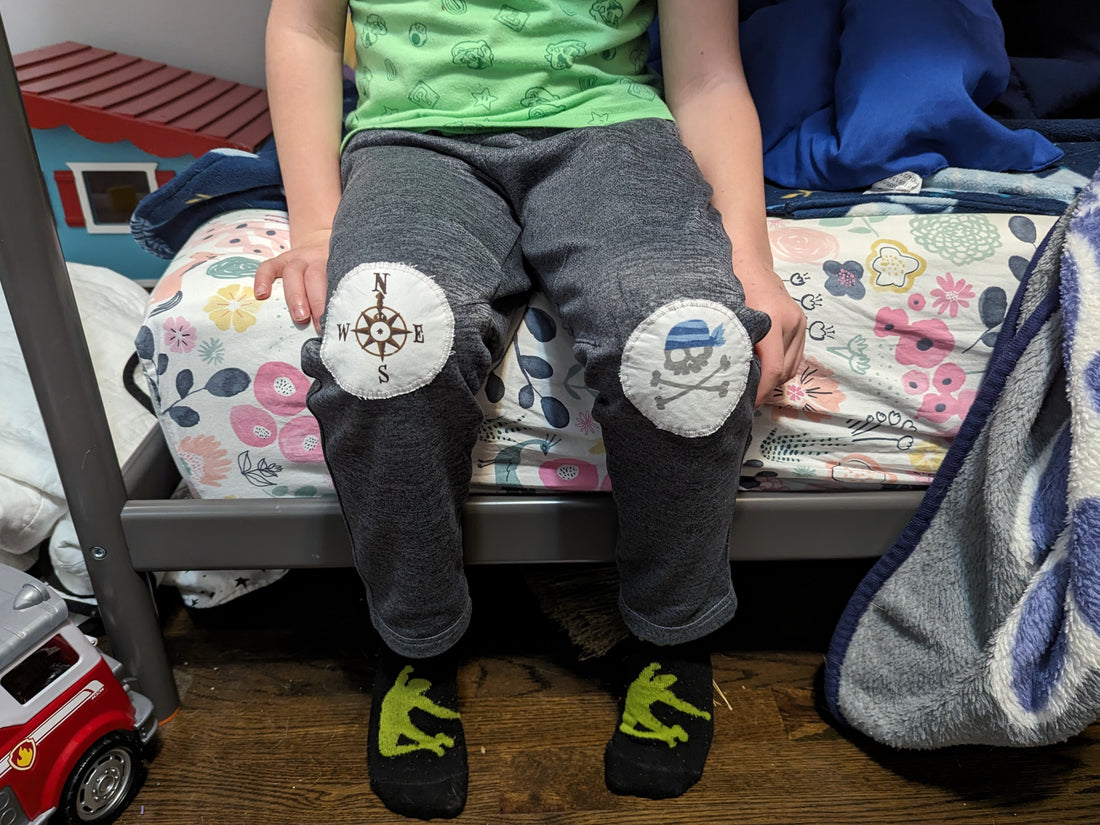 pirate patches made from eco-friendly upcycled fabric on child's pants